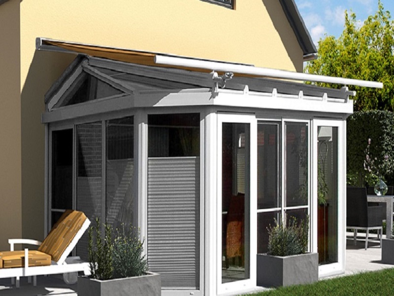 Over the roof conservatory awning - Waterside Home 